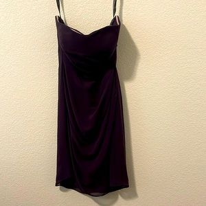 Deep purple strapless bridesmaids dress.